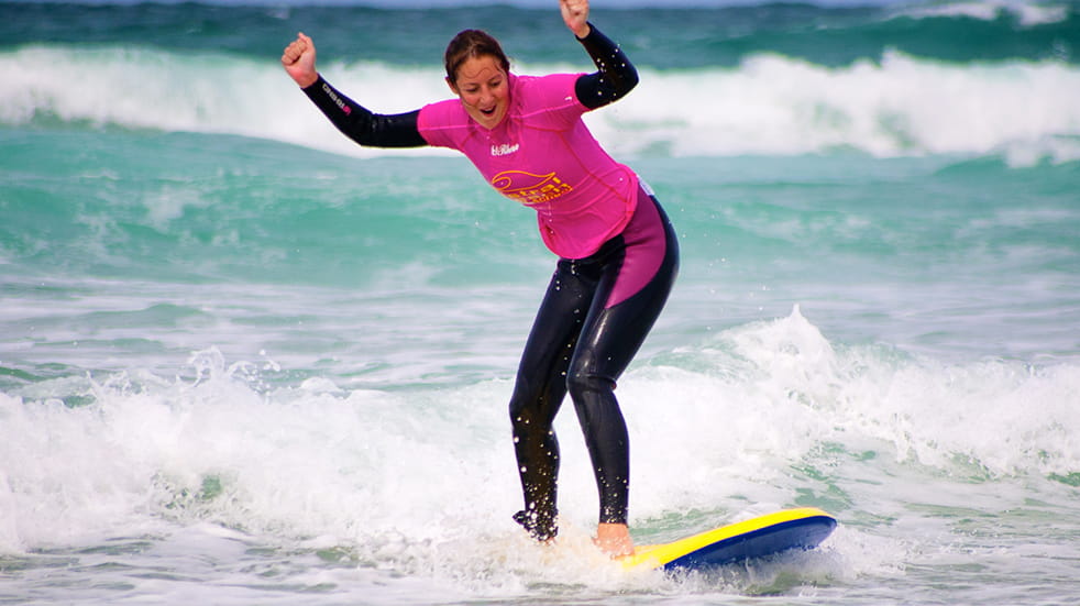 Family sports and fitness - surf lesson
